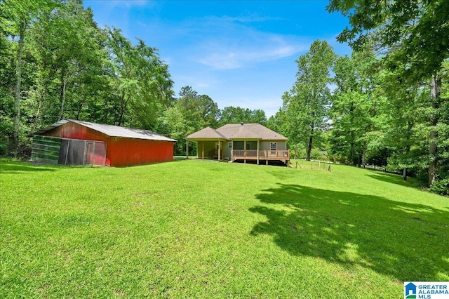 288 Briarfield Rd, Warrior, AL 35180 - view of green lawn with an outbuilding, an outdoor structure, and a deck
