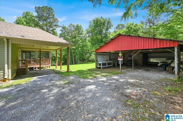 288 Briarfield Rd, Warrior, AL 35180 - view of car parking with an outbuilding and a carport