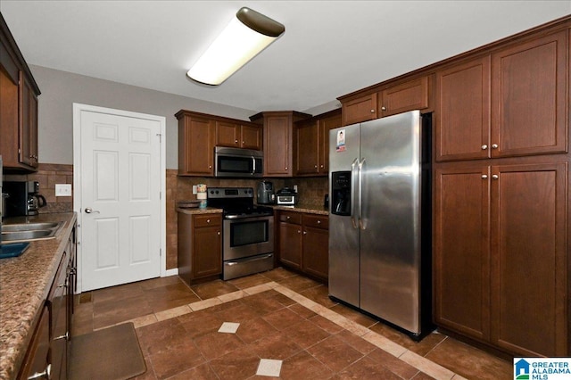 288 Briarfield Rd, Warrior, AL 35180 - kitchen featuring appliances with stainless steel finishes and decorative backsplash