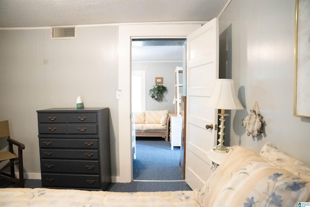 231 Smith Camp Loop, Adger, AL 35006 - carpeted bedroom with crown molding and a textured ceiling