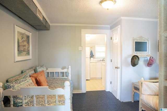 231 Smith Camp Loop, Adger, AL 35006 - carpeted bedroom with a sink, crown molding, a textured ceiling, and freestanding refrigerator
