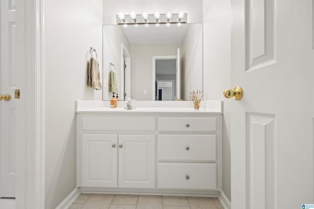 4063 Milners Cres, Hoover, AL 35242 - bathroom with vanity, marble look tile flooring, and baseboards