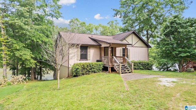 209 Ward Haven Dr, Wedowee, AL 36278 - ranch-style house featuring a front yard and roof with shingles
