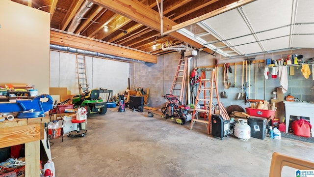 209 Ward Haven Dr, Wedowee, AL 36278 - garage featuring concrete block wall