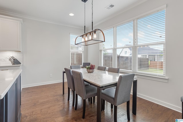 3040 Iris Dr, Hoover, AL 35244 - dining room featuring a chandelier, crown molding, baseboards, healthy amount of natural light, and recessed lighting