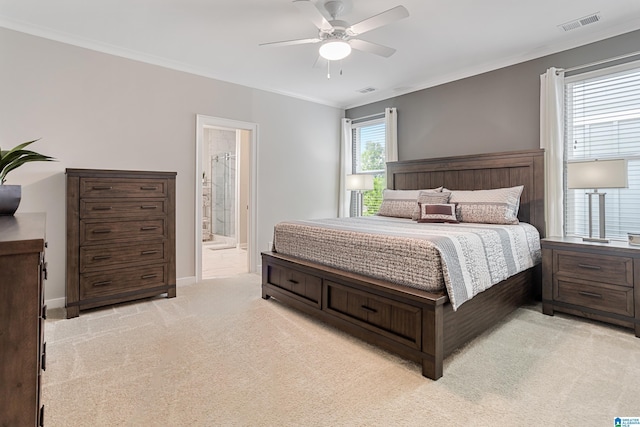 3040 Iris Dr, Hoover, AL 35244 - bedroom with light carpet, crown molding, ceiling fan, connected bathroom, and baseboards
