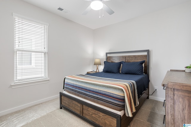 3040 Iris Dr, Hoover, AL 35244 - carpeted bedroom with baseboards and a ceiling fan