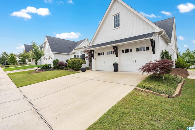 3040 Iris Dr, Hoover, AL 35244 - view of side of property with driveway and a lawn