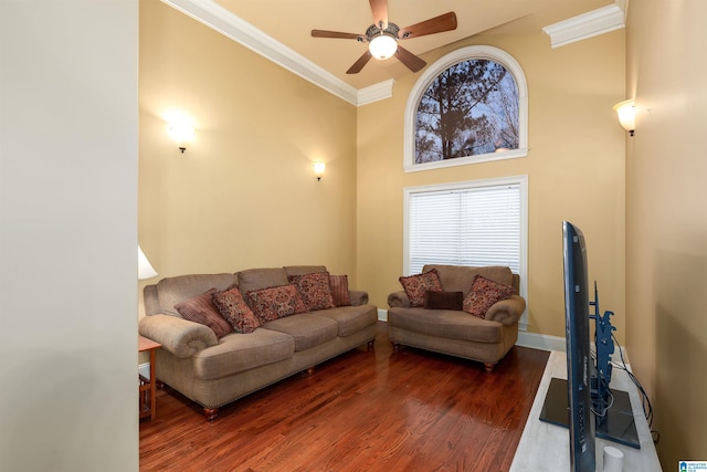 130 Eagle Pointe Way, Pell City, AL 35128 - living area with ornamental molding, ceiling fan, wood finished floors, healthy amount of natural light, and a towering ceiling