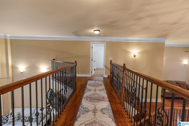 130 Eagle Pointe Way, Pell City, AL 35128 - corridor featuring an upstairs landing, wood finished floors, crown molding, and baseboards