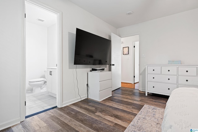 1742 Molly Ln, Birmingham, AL 35235 - bedroom featuring dark wood finished floors, baseboards, and ensuite bathroom