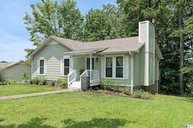 1742 Molly Ln, Birmingham, AL 35235 - ranch-style home with a shingled roof, a front yard, and a chimney