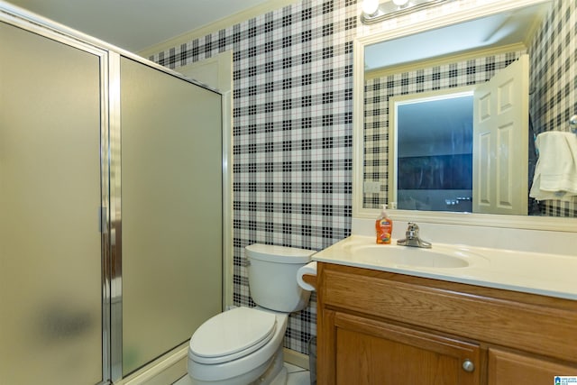 307 N Lake Rd, Hoover, AL 35242 - bathroom with wallpapered walls, vanity, a stall shower, and toilet