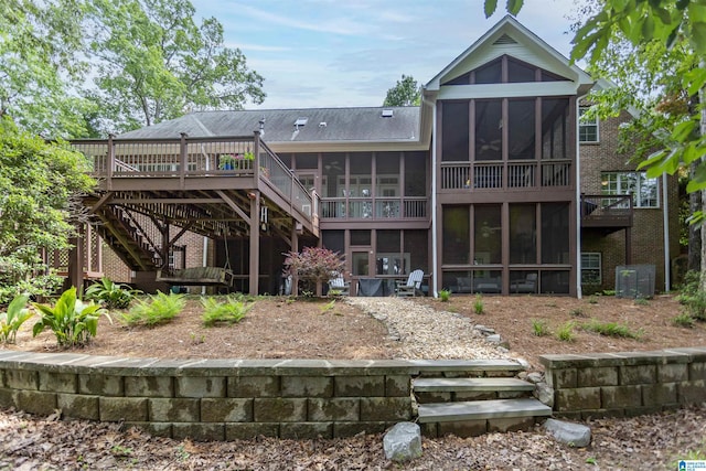 307 N Lake Rd, Hoover, AL 35242 - back of property featuring a sunroom, stairway, and a wooden deck