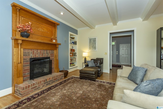 307 N Lake Rd, Hoover, AL 35242 - living room featuring wood finished floors, beam ceiling, a fireplace, crown molding, and baseboards