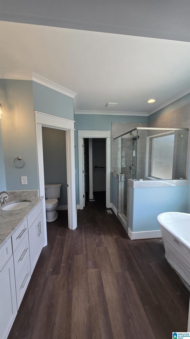 1077 Grande View Pass, Alabaster, AL 35114 - full bathroom with crown molding, a shower stall, wood finished floors, a soaking tub, and vanity