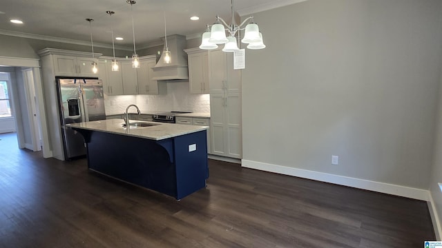 1077 Grande View Pass, Alabaster, AL 35114 - kitchen with appliances with stainless steel finishes, custom exhaust hood, ornamental molding, baseboards, and a sink
