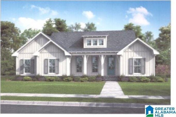 186 Ridgeway Dr, Piedmont, AL 36272 - view of front facade featuring board and batten siding, a front yard, and covered porch