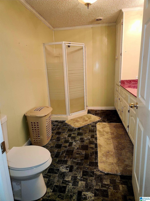 5810 Stemley Bridge Rd, Talladega, AL 35160 - bathroom with toilet, crown molding, a stall shower, a textured ceiling, and vanity
