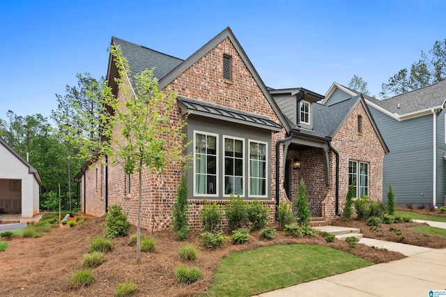 1761 Gable Way, Hoover, AL 35244 - view of front of property with brick siding, a standing seam roof, and a shingled roof