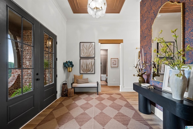 1761 Gable Way, Hoover, AL 35244 - entryway featuring a chandelier, ornamental molding, baseboards, and light wood-style flooring