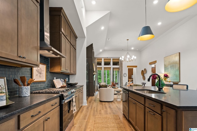 1761 Gable Way, Hoover, AL 35244 - kitchen with gas range, a sink, wall chimney range hood, stainless steel dishwasher, and backsplash