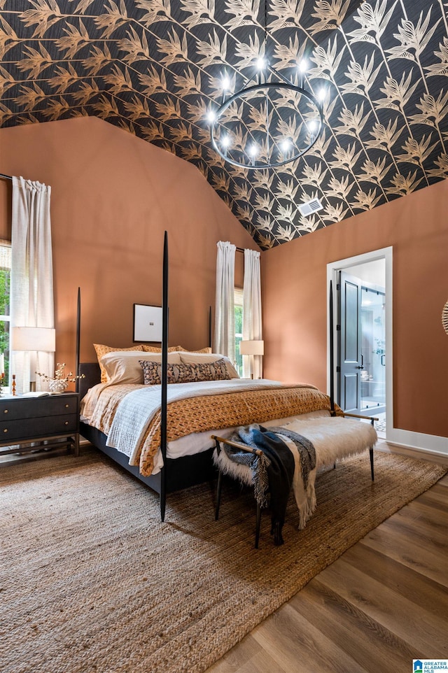 1761 Gable Way, Hoover, AL 35244 - bedroom featuring lofted ceiling, wood finished floors, and ensuite bathroom