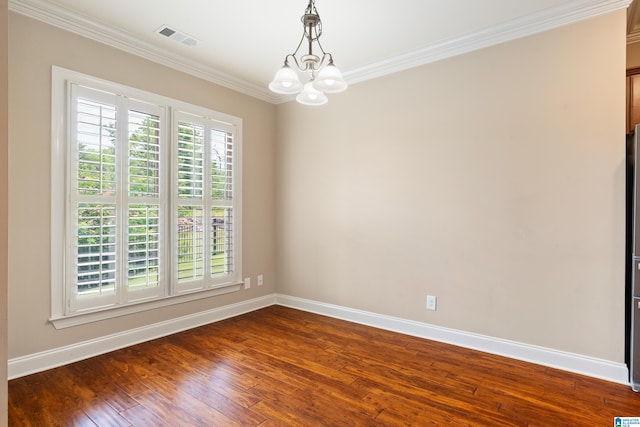 1343 Chapel St, Hoover, AL 35226 - spare room with baseboards, crown molding, dark wood-style flooring, and a chandelier