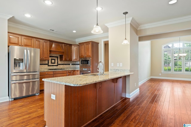 1343 Chapel St, Hoover, AL 35226 - kitchen with stainless steel appliances, a sink, brown cabinetry, custom exhaust hood, and dark wood-type flooring