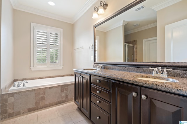 1343 Chapel St, Hoover, AL 35226 - full bathroom featuring double vanity, a garden tub, a stall shower, tile patterned floors, and crown molding