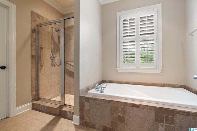 1343 Chapel St, Hoover, AL 35226 - full bathroom featuring a garden tub, a shower stall, ornamental molding, and tile patterned flooring