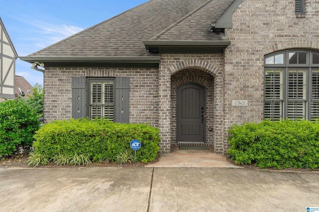 1343 Chapel St, Hoover, AL 35226 - entrance to property featuring roof with shingles and brick siding