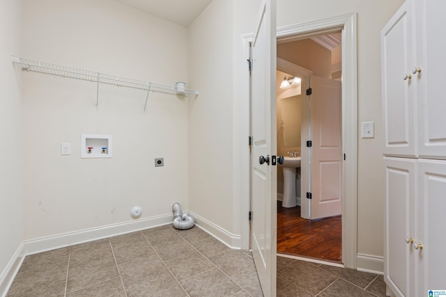 1343 Chapel St, Hoover, AL 35226 - laundry room with electric dryer hookup, hookup for a washing machine, baseboards, and tile patterned floors
