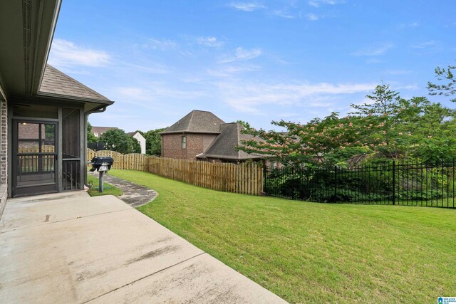 1343 Chapel St, Hoover, AL 35226 - view of yard with a patio area and a sunroom