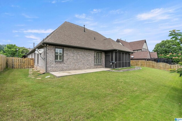 1343 Chapel St, Hoover, AL 35226 - rear view of house featuring brick siding, a sunroom, a patio, and a shingled roof