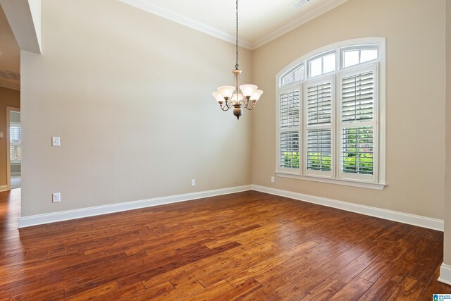 1343 Chapel St, Hoover, AL 35226 - unfurnished room with crown molding, a chandelier, plenty of natural light, dark wood-style floors, and baseboards