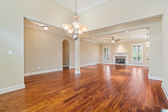 1343 Chapel St, Hoover, AL 35226 - unfurnished living room with arched walkways, wood-type flooring, a chandelier, ceiling fan, and ornamental molding