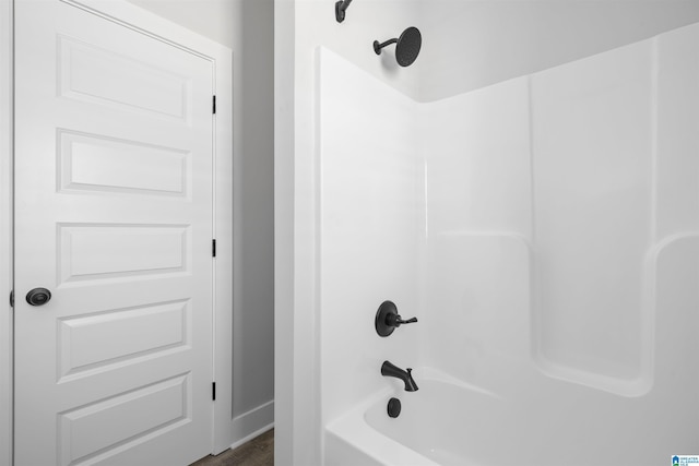 350 Shiloh Creek Dr, Calera, AL 35040 - bathroom featuring tub / shower combination, baseboards, and wood finished floors