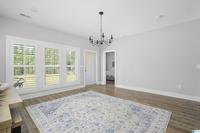 350 Shiloh Creek Dr, Calera, AL 35040 - dining room featuring a chandelier, dark wood-style floors, and baseboards