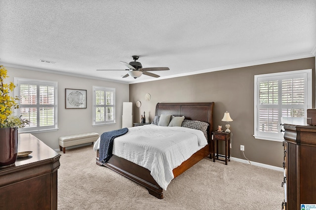 545 Russet Bend Dr, Hoover, AL 35244 - bedroom with crown molding, light carpet, a textured ceiling, a ceiling fan, and baseboards