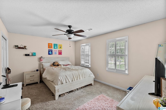 545 Russet Bend Dr, Hoover, AL 35244 - bedroom featuring a textured ceiling, carpet flooring, a ceiling fan, and baseboards