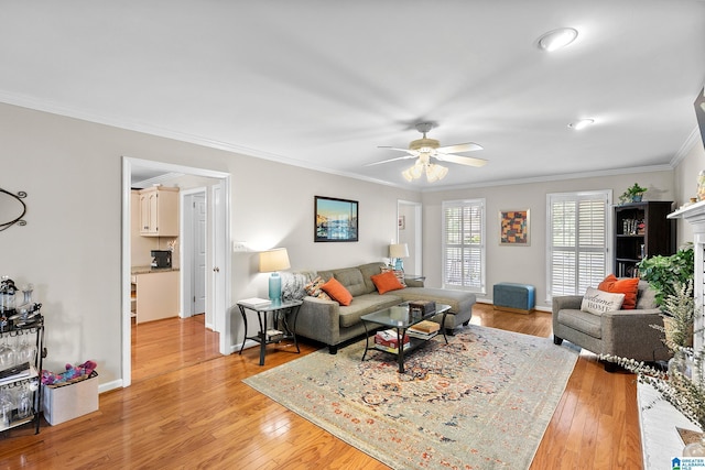 545 Russet Bend Dr, Hoover, AL 35244 - living area with ceiling fan, light wood-style flooring, ornamental molding, and baseboards