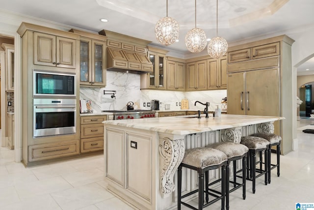 2821 Shook Hill Cir, Mountain Brook, AL 35223 - kitchen featuring stainless steel oven, black microwave, arched walkways, a sink, and crown molding