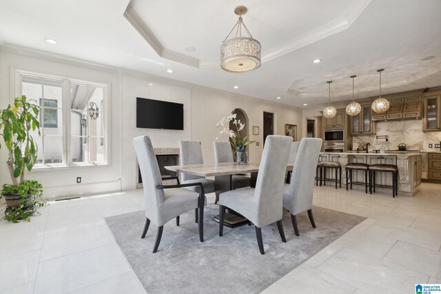 2821 Shook Hill Cir, Mountain Brook, AL 35223 - dining room with a tray ceiling, recessed lighting, and ornamental molding