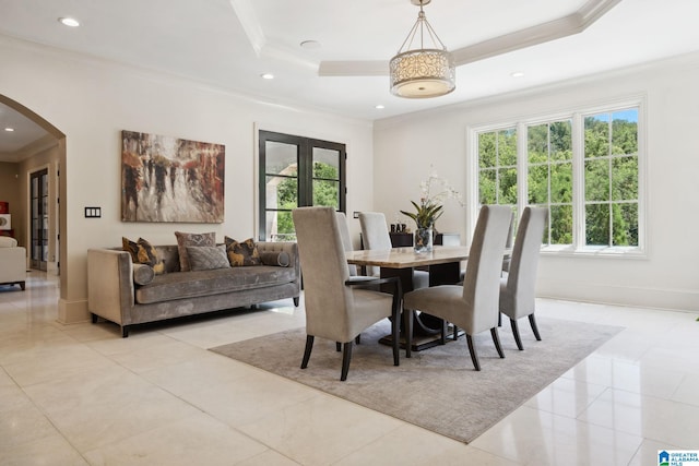 2821 Shook Hill Cir, Mountain Brook, AL 35223 - dining area featuring arched walkways, crown molding, a tray ceiling, recessed lighting, and baseboards