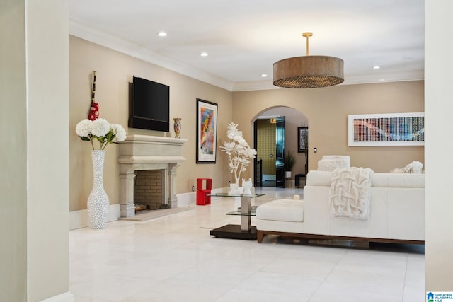 2821 Shook Hill Cir, Mountain Brook, AL 35223 - living room with arched walkways, recessed lighting, crown molding, and a fireplace with raised hearth