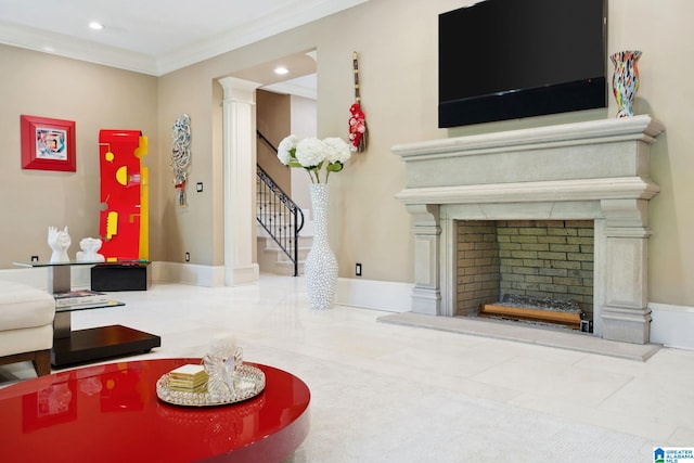 2821 Shook Hill Cir, Mountain Brook, AL 35223 - living area with stairs, a fireplace with raised hearth, recessed lighting, ornamental molding, and decorative columns
