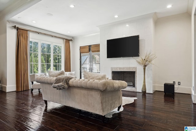 2821 Shook Hill Cir, Mountain Brook, AL 35223 - living room with wood-type flooring, crown molding, a tiled fireplace, baseboards, and recessed lighting