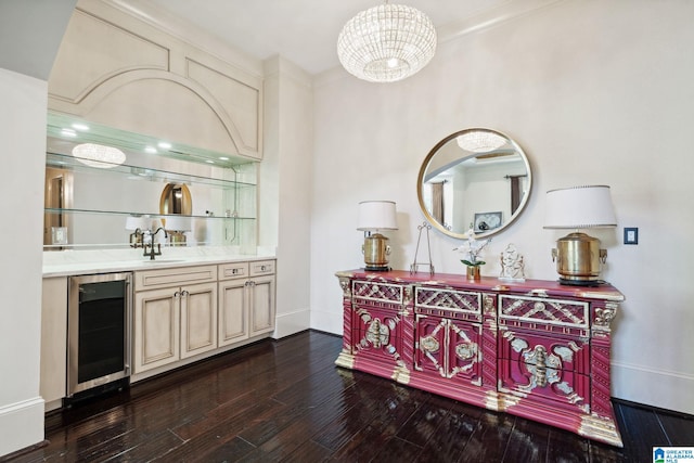2821 Shook Hill Cir, Mountain Brook, AL 35223 - indoor wet bar with wine cooler, baseboards, dark wood-type flooring, and a chandelier