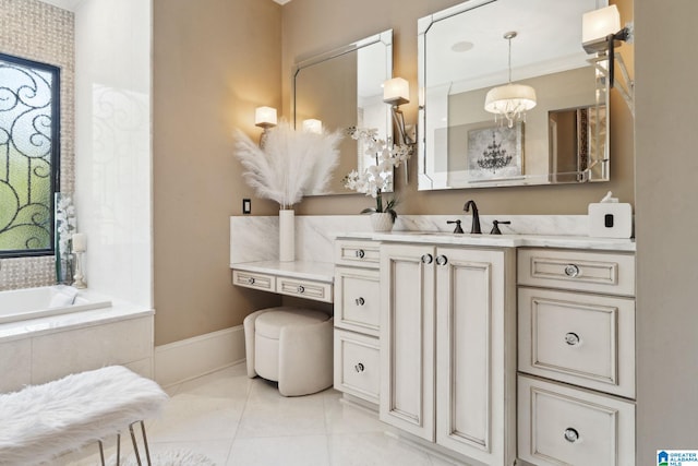 2821 Shook Hill Cir, Mountain Brook, AL 35223 - bathroom with vanity, a relaxing tiled tub, tile patterned flooring, and baseboards